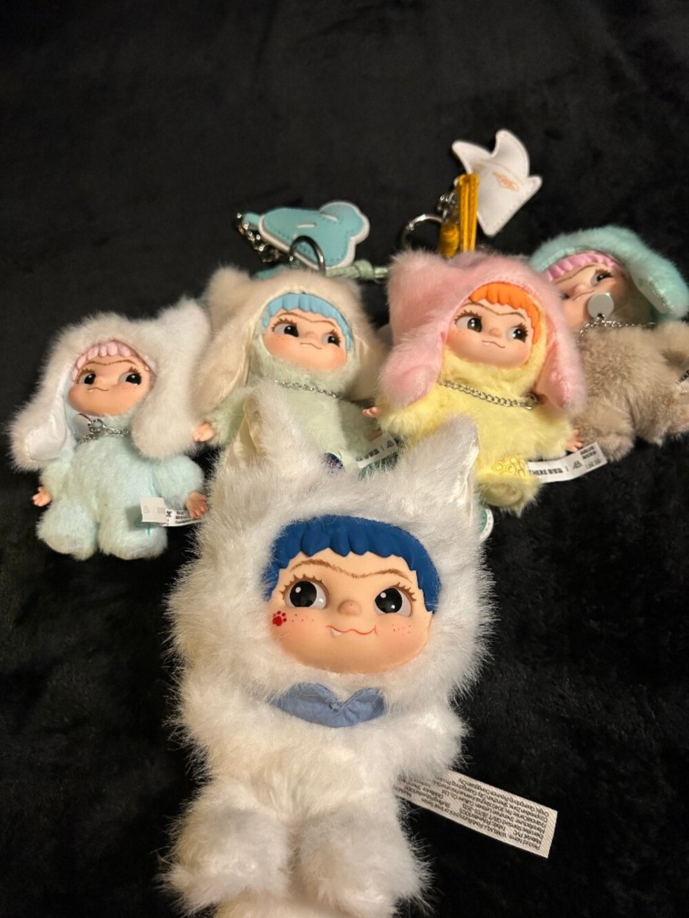 Wakuku plush bag charm/keychain bundle.